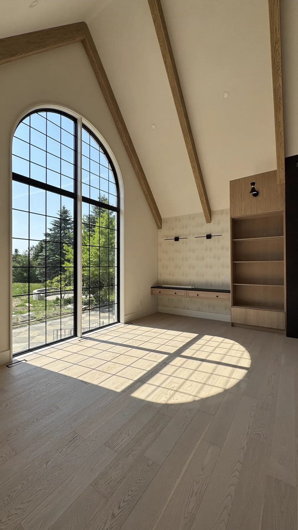 Belsite architectural window detail with sunlight pattern on oak flooring