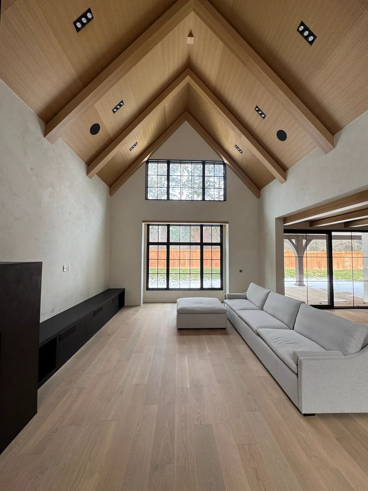 Rushworth vaulted living room with exposed beams and limewash walls