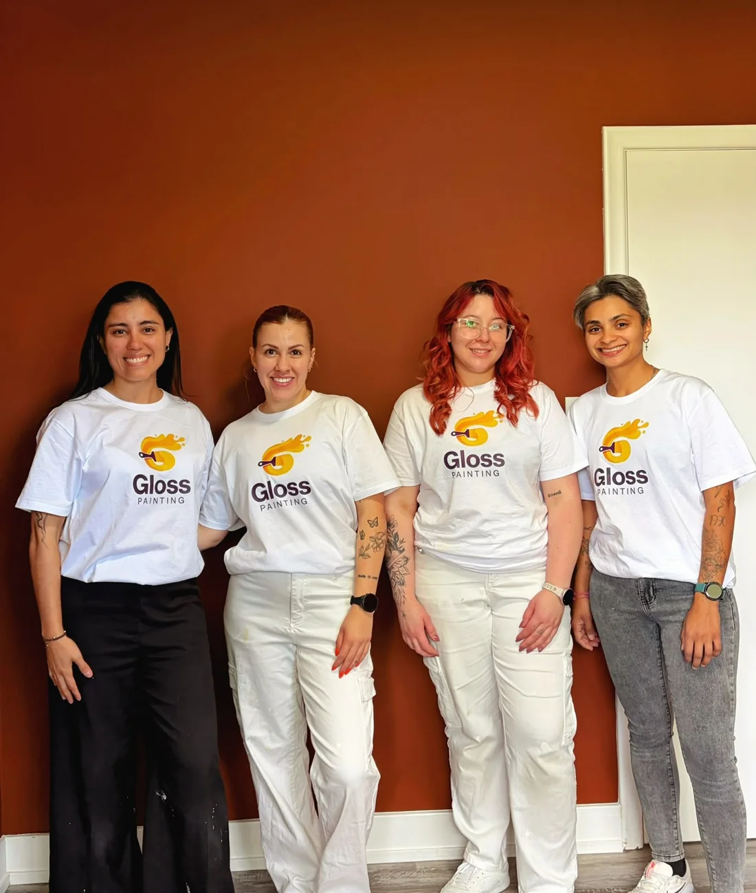 The four women of the Gloss Painting team standing together
