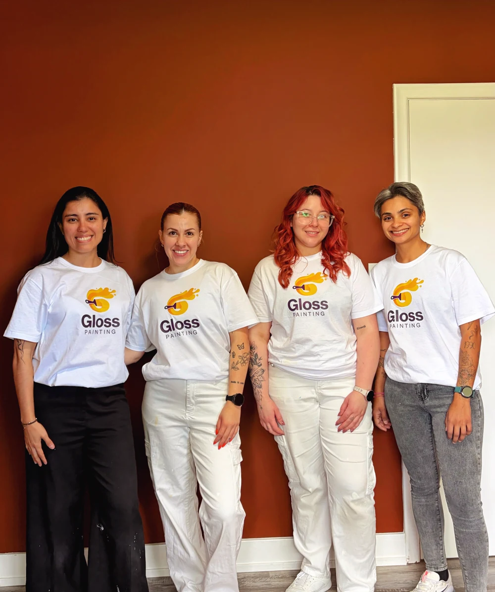 Four members of the Gloss Painting team standing together